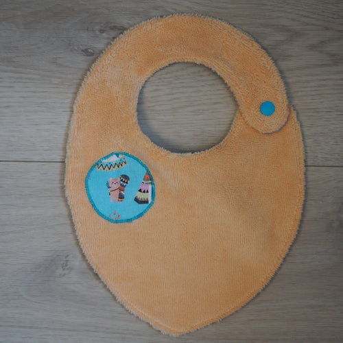bavoir pour bébé orange et bleu aux motifs de tipis et d'animaux
