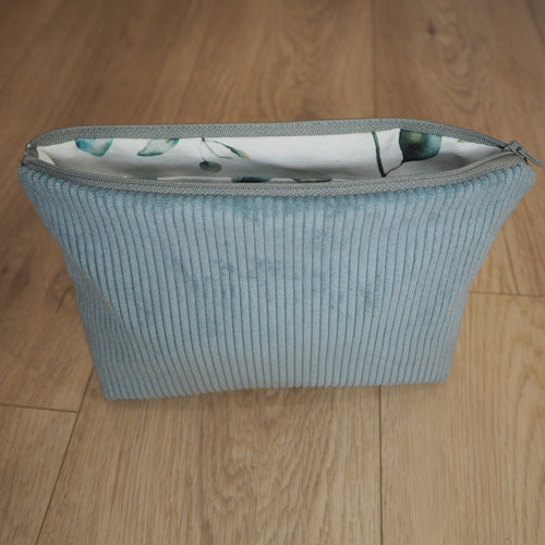 trousse de toilette bleu avec intérieur imperméable feuilles d'eucalyptus