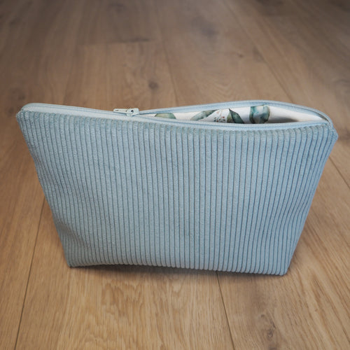 petite trousse de toilette bleu, intérieur feuillage