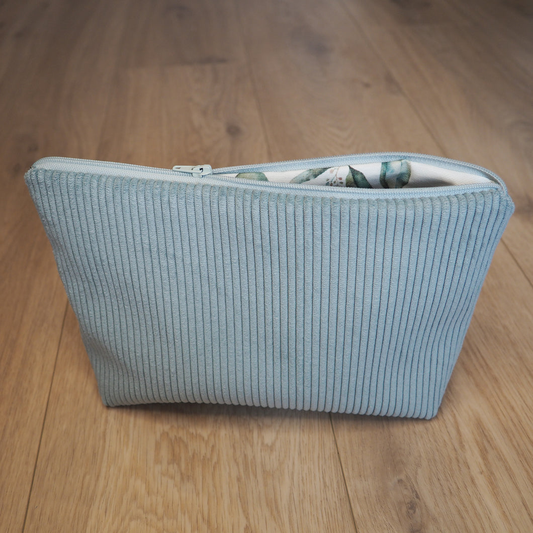 petite trousse de toilette bleu, intérieur feuillage